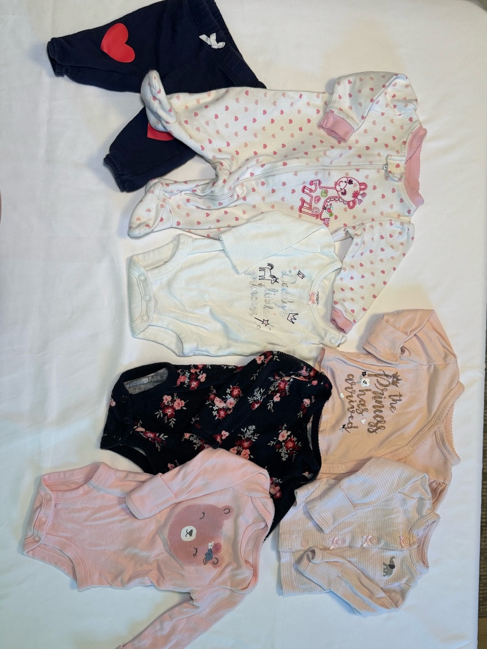 Girls 7-piece Mixed Branded Newborn Bundle. 1-pair of heart kneed pants.